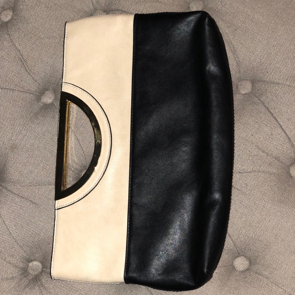 The Limited Black & white clutch